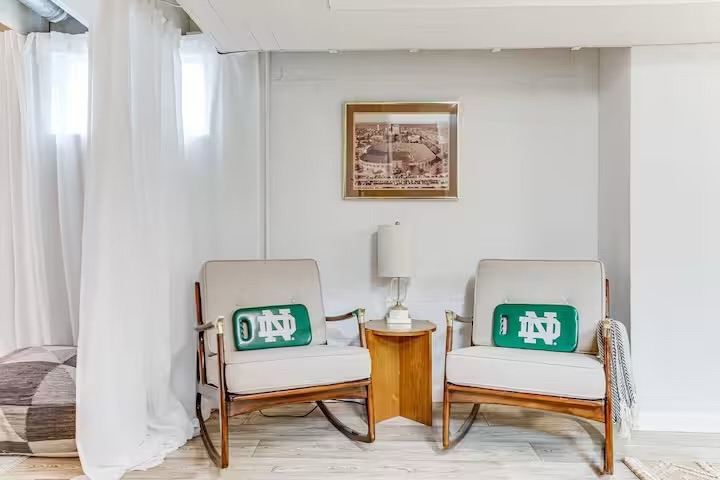 Basement reading nook with Notre Dame pillows at The Lucky Charm South Bend vacation rental