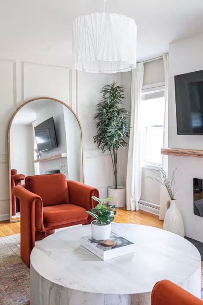 Living room detail with mirror and coffee table at The Lucky Charm